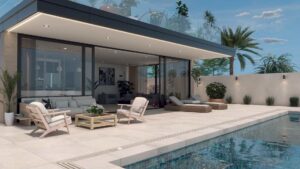 3D architectural rendering of a luxurious outdoor swimming pool, surrounded by lush landscaping and modern deck furniture