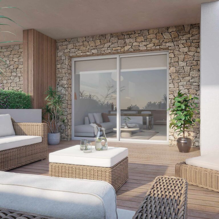Terraza moderna de lujo con paredes de piedra natural, suelo de madera y muebles de mimbre en Bilbao